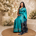 Firozi Utsav Handwoven Pure Kosa Silk Saree with Warli Tribal Art Borders